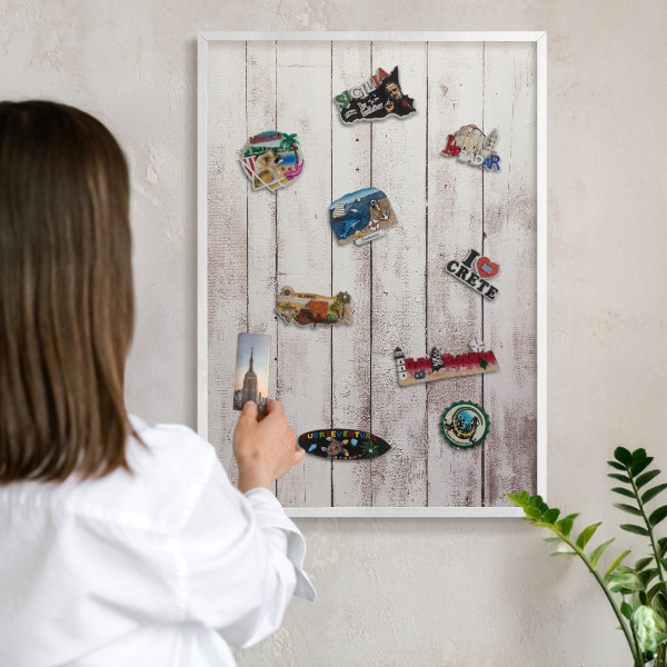 Decorative magnet board with a white frame Light wood