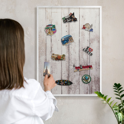 Decorative magnet board with a white frame Light wood
