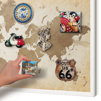Magnetic board for travel magnets in a white frame World map