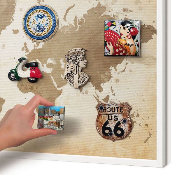 Magnetic board for travel magnets in a white frame World map