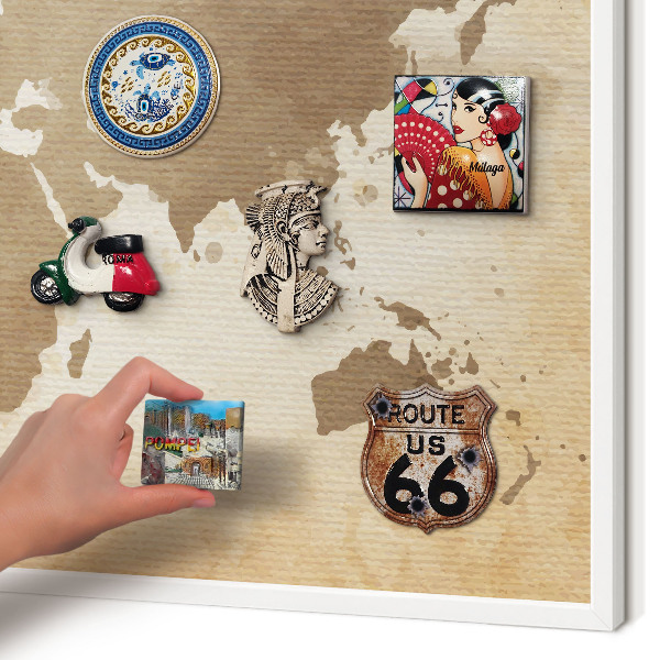 Magnetic board for travel magnets in a white frame World map