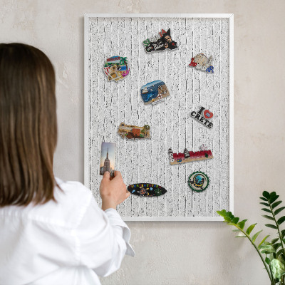 Decorative magnet board with a white frame Brick wall