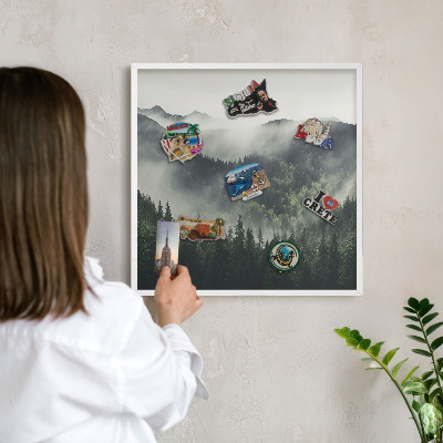 Decorative magnet board with a white frame Green mountains