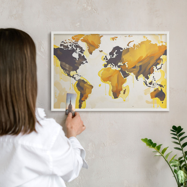 Magnetic board for travel magnets in a white frame World map