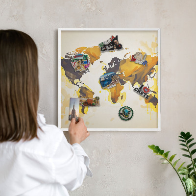 Magnetic board for travel magnets in a white frame World map