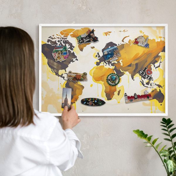 Magnetic board for travel magnets in a white frame World map