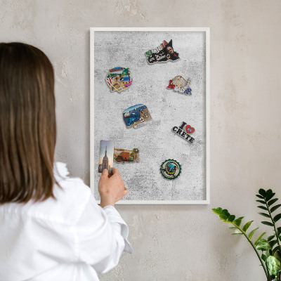 Decorative magnet board with a white frame Raw concrete
