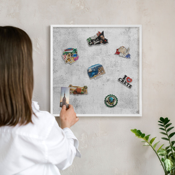 Decorative magnet board with a white frame Raw concrete