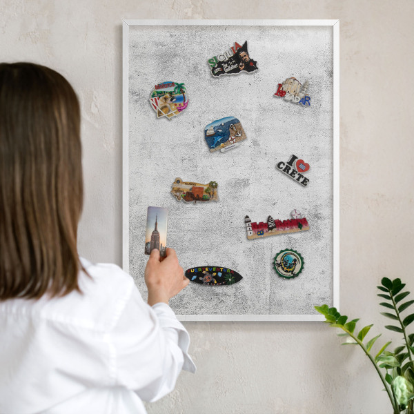 Decorative magnet board with a white frame Raw concrete