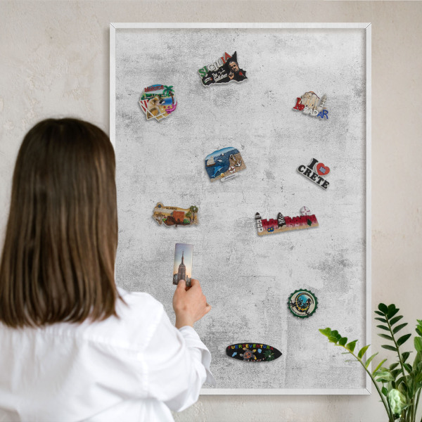 Decorative magnet board with a white frame Raw concrete
