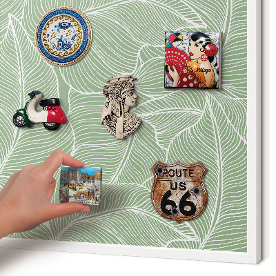 Magnetic board for travel magnets in a white frame Tropical leaves