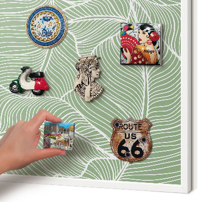 Magnetic board for travel magnets in a white frame Tropical leaves