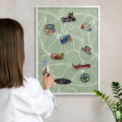 Magnetic board for travel magnets in a white frame Tropical leaves