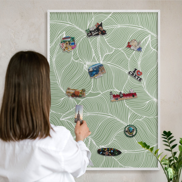 Magnetic board for travel magnets in a white frame Tropical leaves