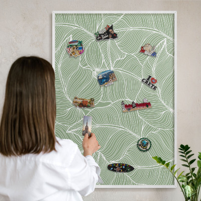 Magnetic board for travel magnets in a white frame Tropical leaves