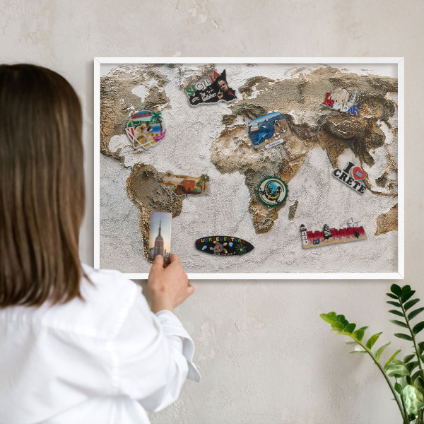 Magnetic board for travel magnets in a white frame Relief map