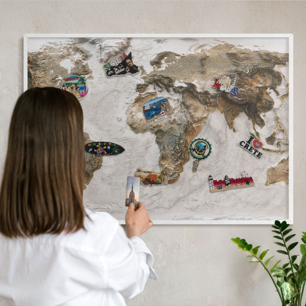 Magnetic board for travel magnets in a white frame Relief map