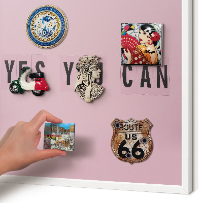 Magnetic board for travel magnets in a white frame Motivation every day