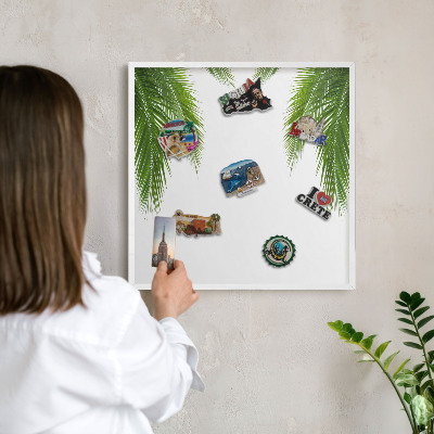 Magnetic board for travel magnets in a white frame Exotic nature