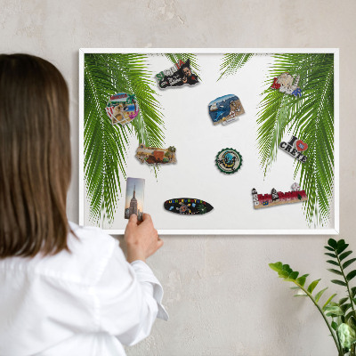 Magnetic board for travel magnets in a white frame Exotic nature