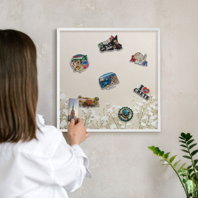 Decorative magnet board with a white frame Subtle nature