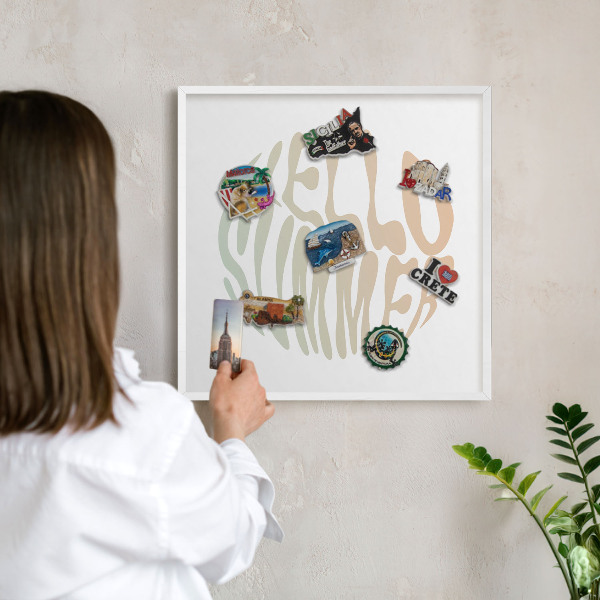 Magnetic board for travel magnets in a white frame Hello summer