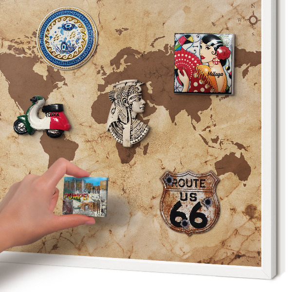 Magnetic board for travel magnets in a white frame World map