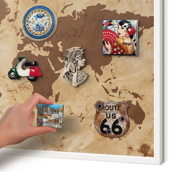 Magnetic board for travel magnets in a white frame World map