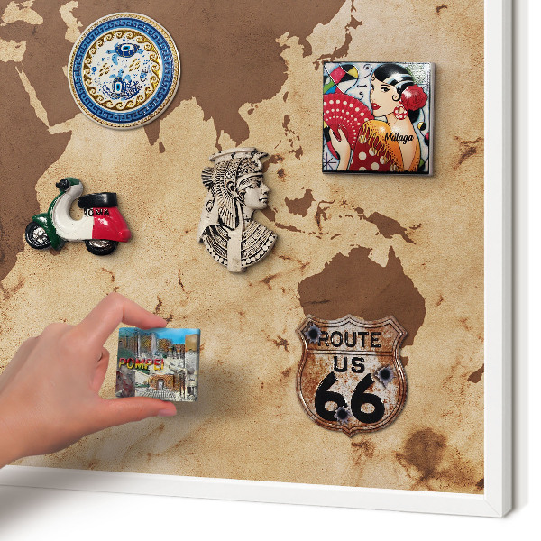 Magnetic board for travel magnets in a white frame World map