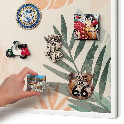 Decorative magnet board with a white frame Tropical leaves