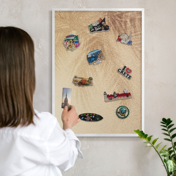 Magnetic board for travel magnets in a white frame Sand leaves