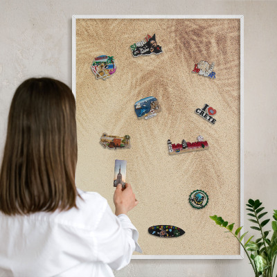 Magnetic board for travel magnets in a white frame Sand leaves