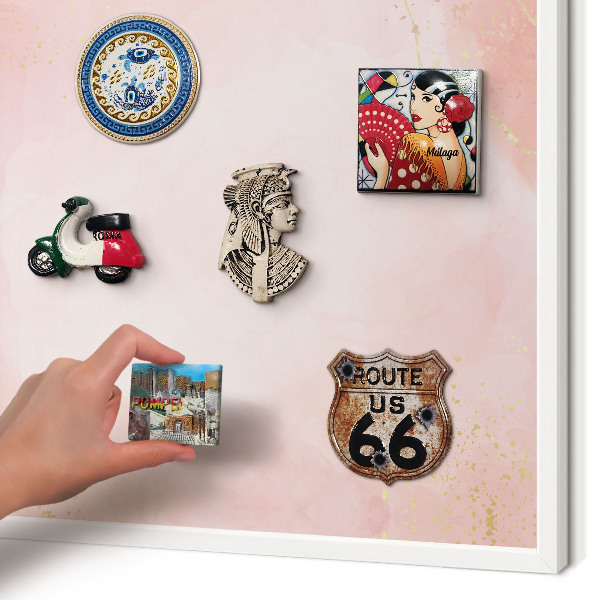 Magnetic board for travel magnets in a white frame Subtle elegance