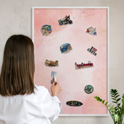 Magnetic board for travel magnets in a white frame Subtle elegance