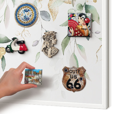 Magnetic board for travel magnets in a white frame Green leaves