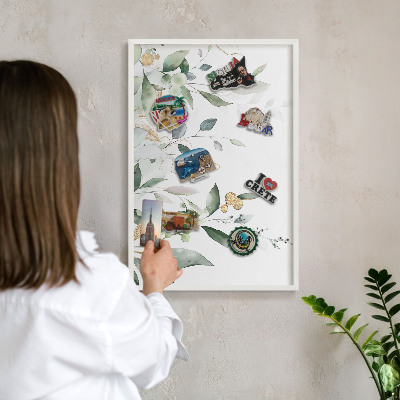 Magnetic board for travel magnets in a white frame Green leaves