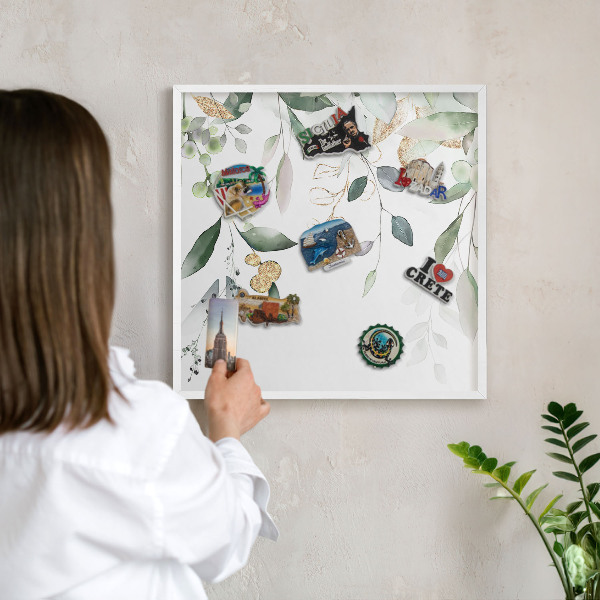 Magnetic board for travel magnets in a white frame Green leaves