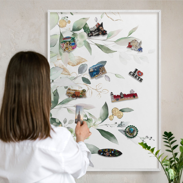 Magnetic board for travel magnets in a white frame Green leaves