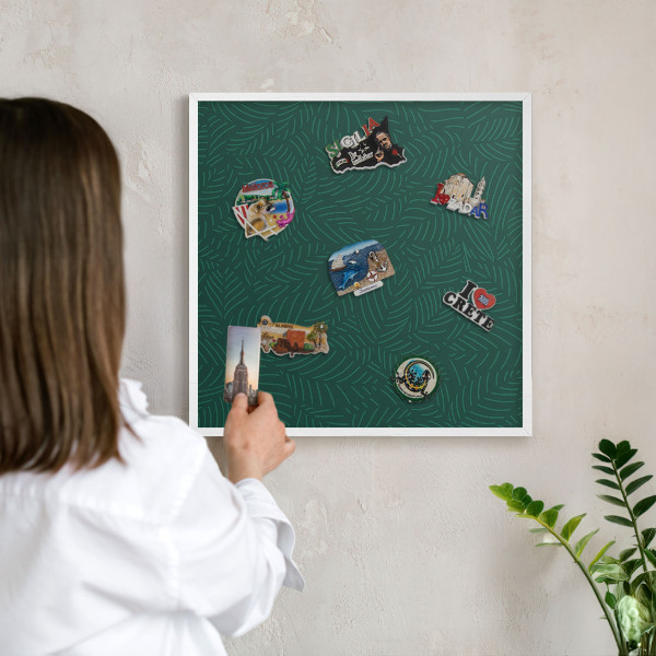 Magnetic board for travel magnets in a white frame Green leaves