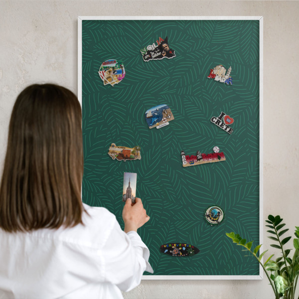 Magnetic board for travel magnets in a white frame Green leaves