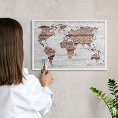 Decorative magnet board with a white frame Brick map