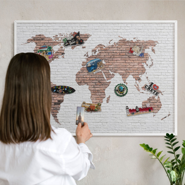 Decorative magnet board with a white frame Brick map