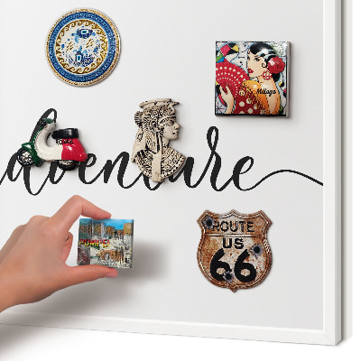 Decorative magnet board with a white frame Adventure written