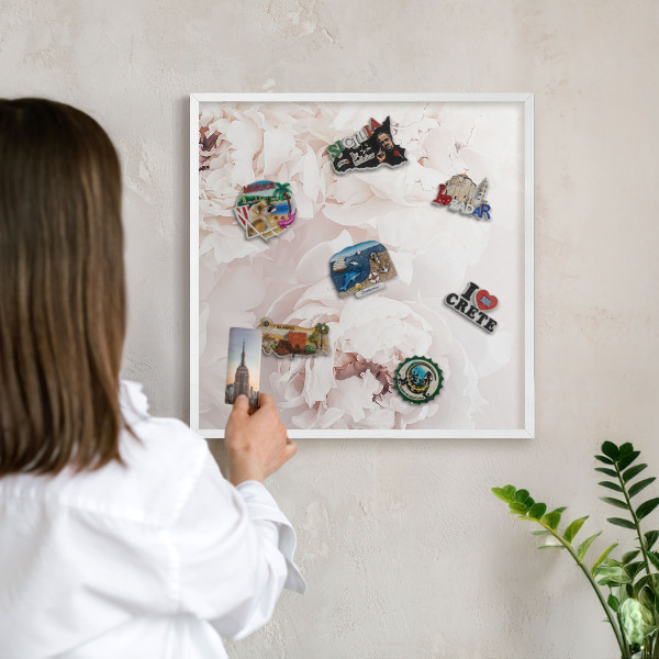 Decorative magnet board with a white frame White peonies