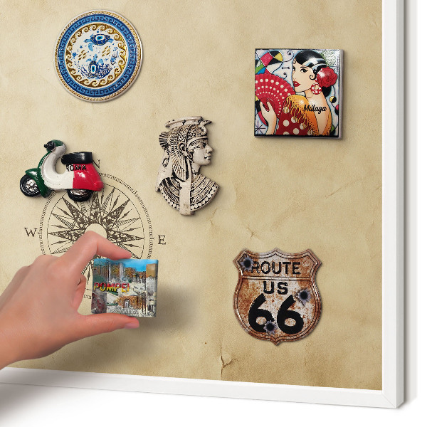 Magnetic board for travel magnets in a white frame Wind rose
