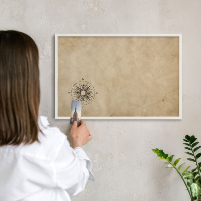 Magnetic board for travel magnets in a white frame Wind rose