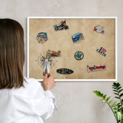 Magnetic board for travel magnets in a white frame Wind rose