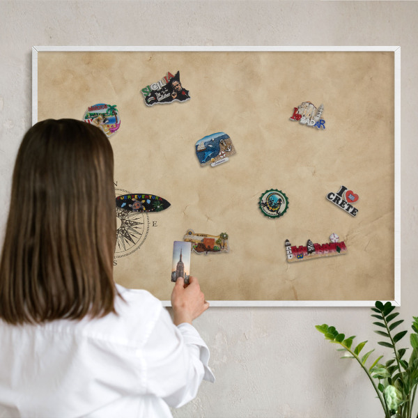 Magnetic board for travel magnets in a white frame Wind rose