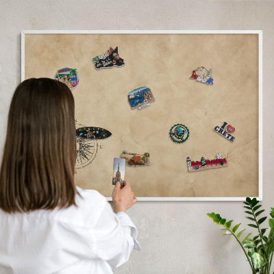 Magnetic board for travel magnets in a white frame Wind rose