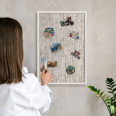 Magnetic board for travel magnets in a white frame Brick pattern